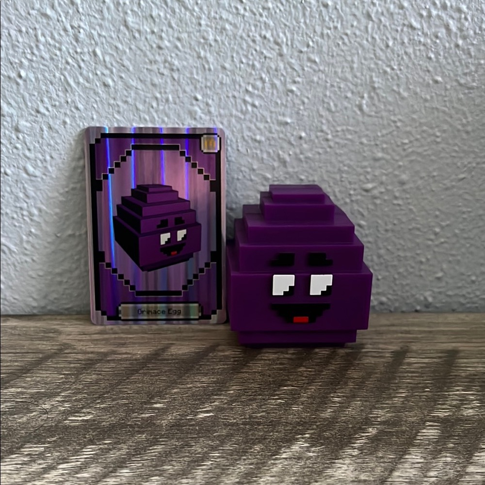Purple Pixelated Character Figurine